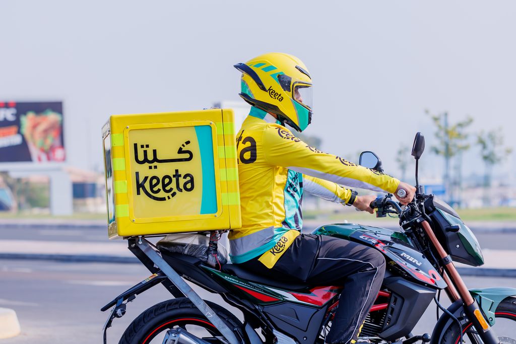 A YaBalash delivery rider on the road in Abu Dhabi.